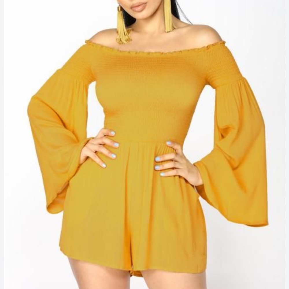 FashionNova Small World Smocked Romper in Yellow